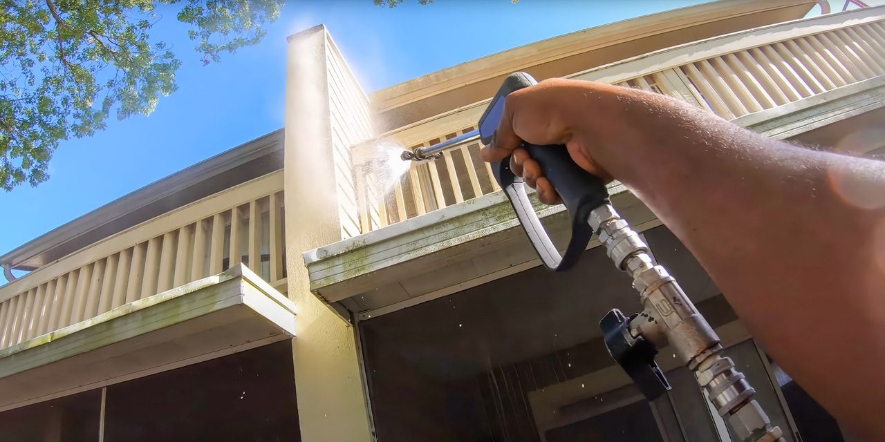Pressure washing the underside of a porch roof