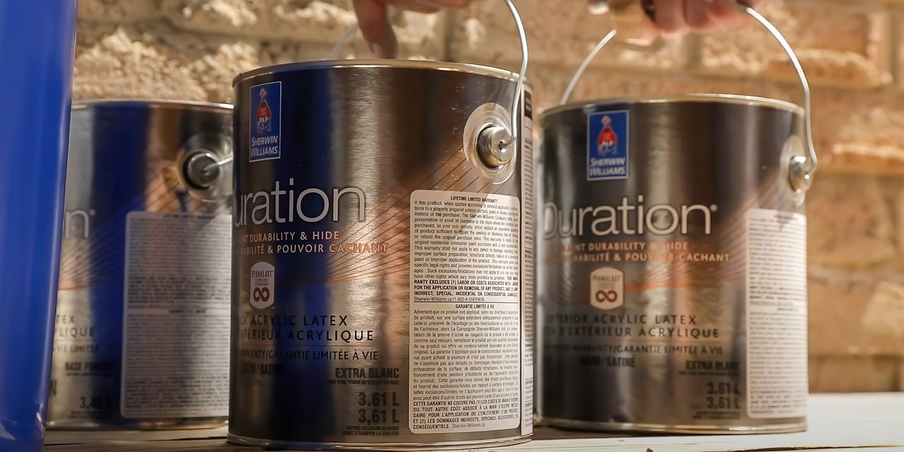 Cans of Sherwin-Williams Duration paint